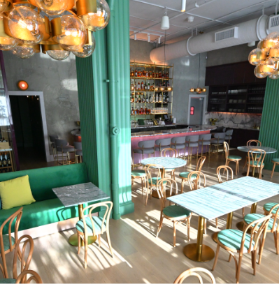 Indoor seating at a restaurant DC Green has built.